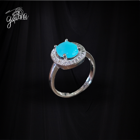 STAINLESS STEEL OVAL SHAPE RING WITH SKY BLUE GEM STONE